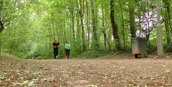 Young Couple Running in Nature