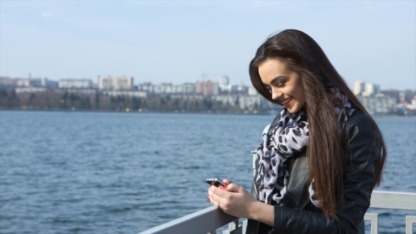 Girl On The Beach Writing Sms