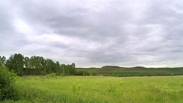 Green Meadow And Clouds