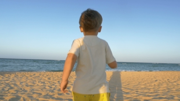 Boy Running To The Sea