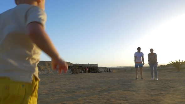 Child Running To Beloved Mom And Dad alt