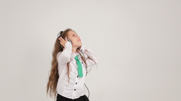 Little Cute Girl Listening To Music With