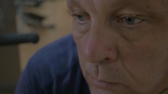 Man Exhausted After Training And Looking alt