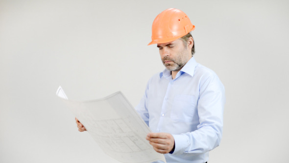 Engineer Checking Blueprint