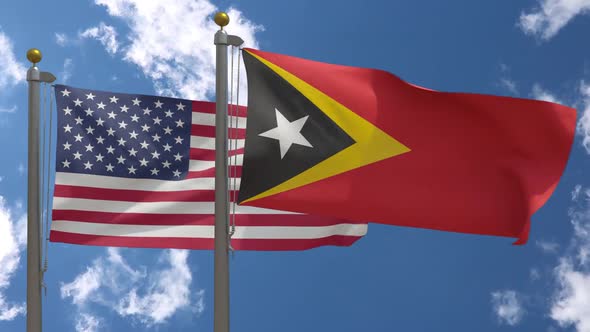 Usa Flag Vs East Timor Flag On Flagpole