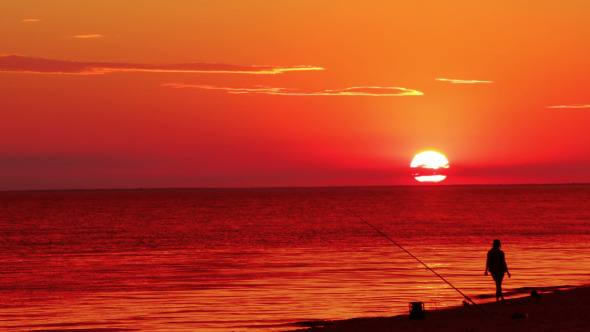 Fisherwoman and Sunset over Sea