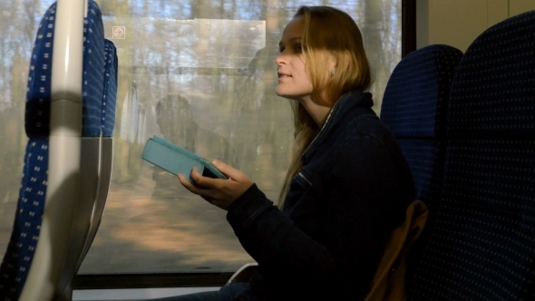 Woman With Tablet PC On Train