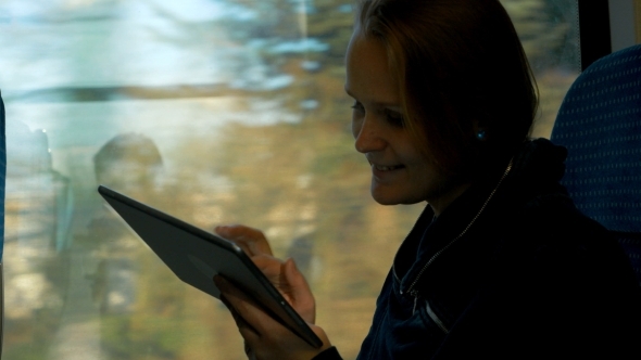 Woman Staying In Touch On The Way