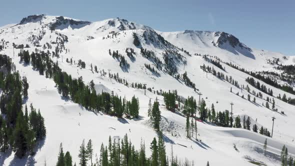 Aerial Light Snowfall Cinematic Mammoth Mountain Ski Area Resort Aerial  USA