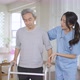 Caretaker helping elderly woman with walking physical therapy - VideoHive Item for Sale