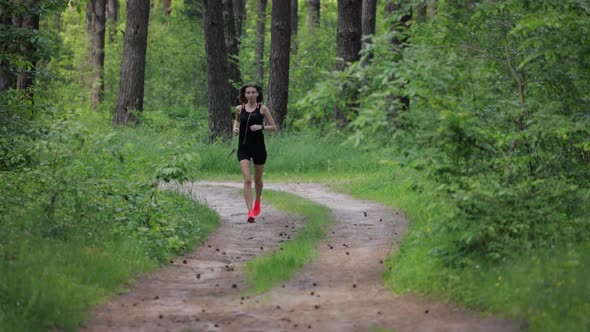 Woman Trail Running on Nature