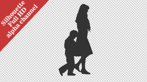 Silhouette of a Woman Walking with a Little Boy
