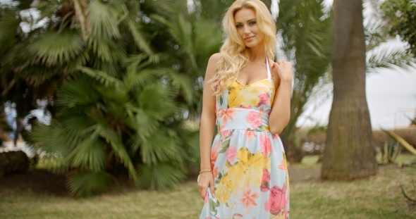 Portrait Of Blond Woman In Tropical Location alt