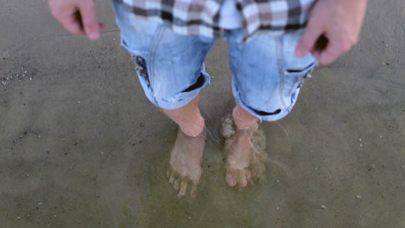 Feet on the Beach View from Above