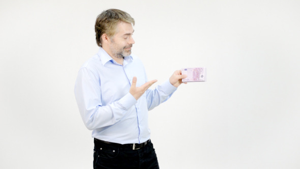 Man Smiling with Money in hands 
