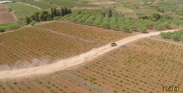 Car Running through the Fields