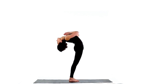Young Woman Make Yoga Training On White