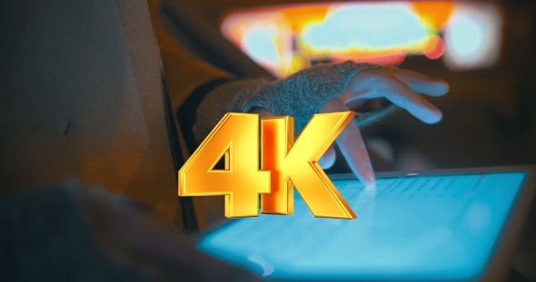 Woman Typing On Tablet PC Outdoor Near Subway alt