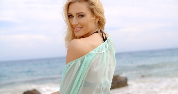 Pretty Blond Woman Wearing Light Mint Beachwear