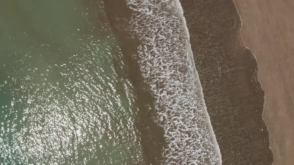Drone view of waves and shoreline