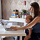 Young Mother with a Child Working at a Computer - VideoHive Item for Sale