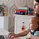 Young Mother with a Child Working at a Notebook - VideoHive Item for Sale