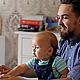 Young Father with a Child Working on a Computer - VideoHive Item for Sale
