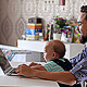 Young Father with a Child Working on a Computer - VideoHive Item for Sale