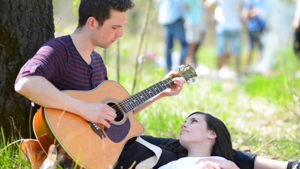 Couple Relaxing at Picnic