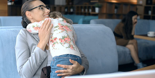 Business Woman and Mother in One alt