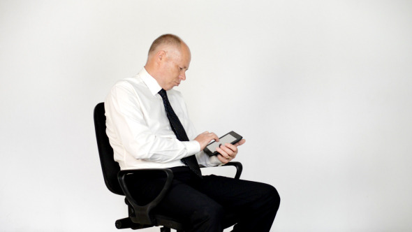 Relax Businessman Using Tablet