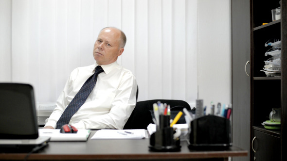 Businessman in Office Relaxing