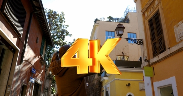 Woman With Pad Walking Outdoor On Sunny Day alt