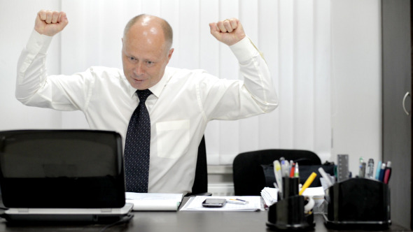 Excited man , Working on Laptop