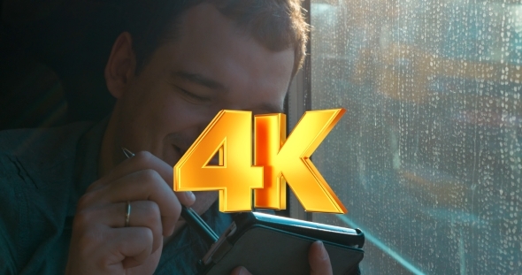 Happy Man Chatting On The Mobile Phone alt