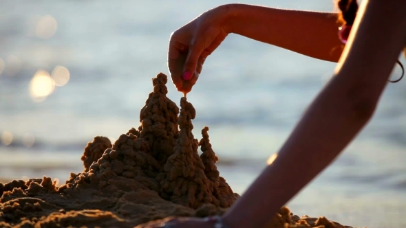 Girl On The Sea Builds a Sand Castle Antalya