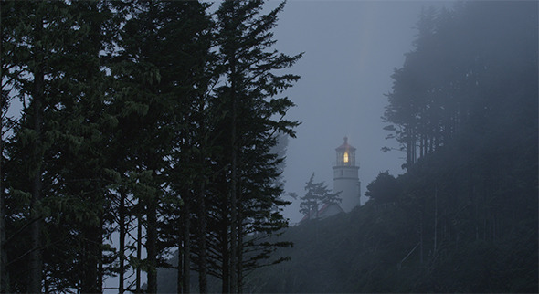 Lighthouse In Fog