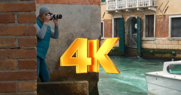 Photographer Working By The Canal In Venice