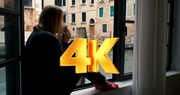 Woman Drinking Coffee And Looking At Venice View