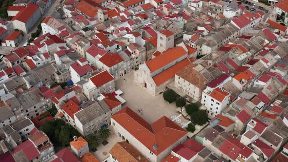 Colorful Aerial Landscape View Of Rooftops Of The Residential Houses And Buildings In Pag Town On Th