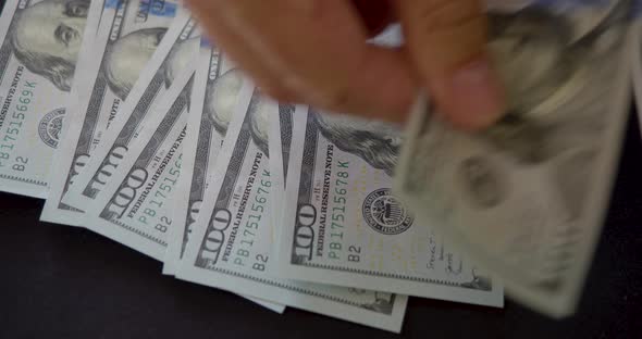 Counting Money  Top View of a Large Bundle of Hundred Dollar Bills