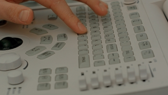 Control Panel Of Medical Device With Doctor's Hand