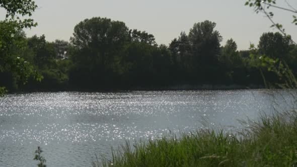 Floating River, Woman's Silhouette Is Walking