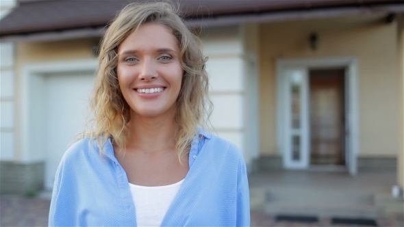 Beautiful Girl Next To Her House alt