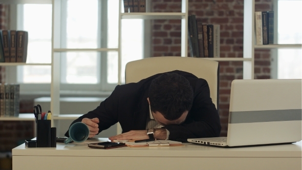Tired Businessman Sleeping With Laptop, Wake Up