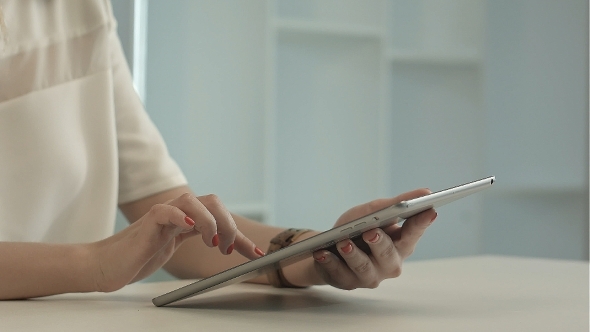 Woman Using Tablet, Browsing Internet