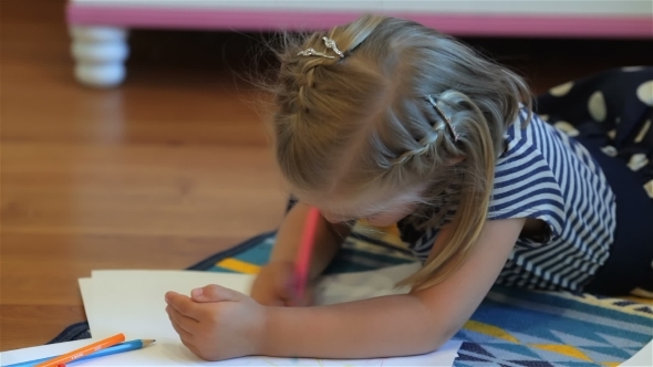 Little Girl Drawing With Pencils alt