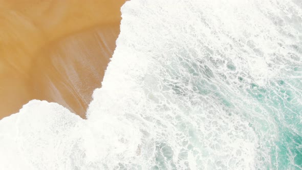 Upper View of Powerful Wide Ocean Waves Washing Sand Beach