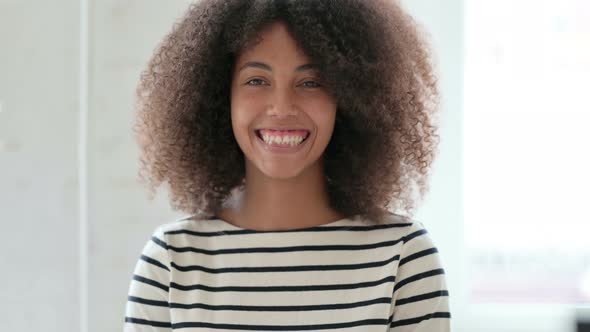 Smiling African Woman Looking at Camera 