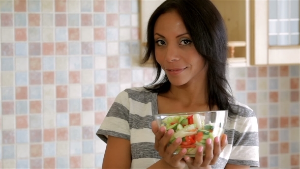 Housewife In Kitchen With Salad alt